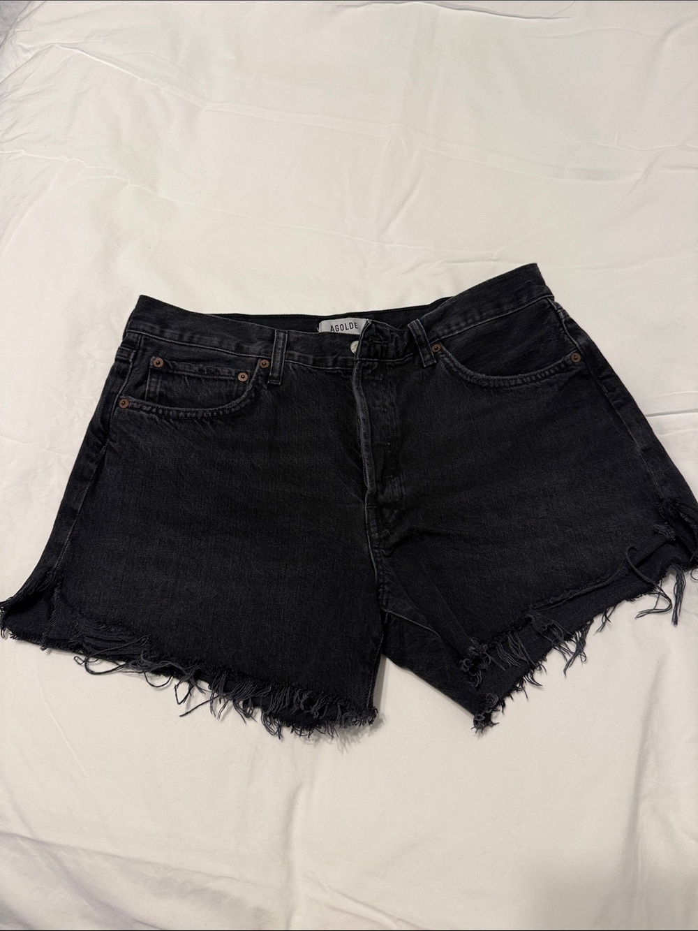 Like New. AGOLDE Parker Vintage Cut Off Denim Shorts in Black Vortex Size 30
